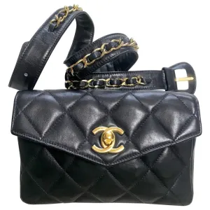 1980s. Vintage CHANEL black lamb leather belt bag, waist bag, fanny pack with golden chain belt & CC closure.  Belt size good for 23.8" through 26.2" (60.5-66.5cm)