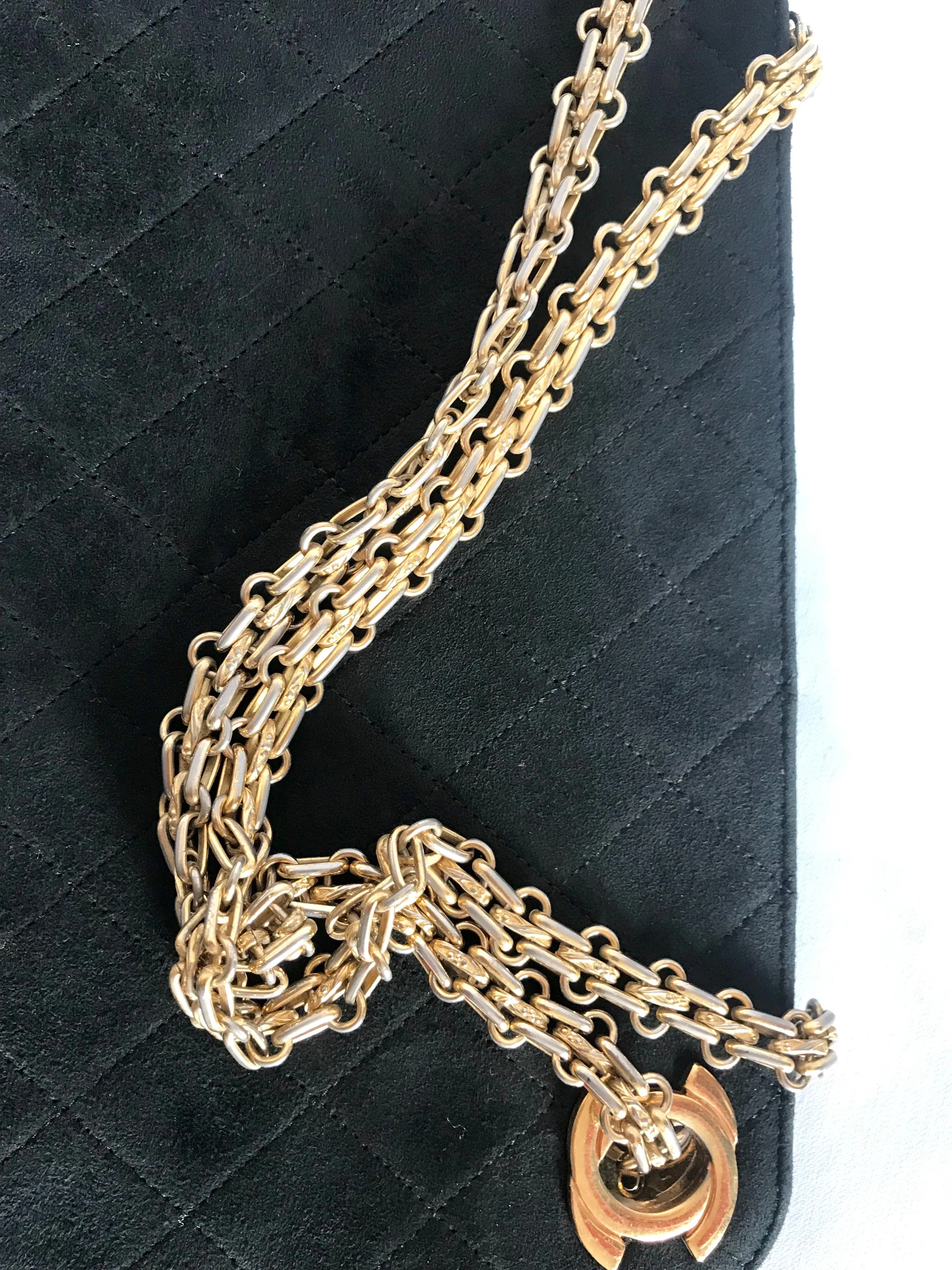 70's, 80's Vintage CHANEL genuine black suede leather kiss lock closure shoulder bag with gold tone CC marks and skinny chains. Rare purse.