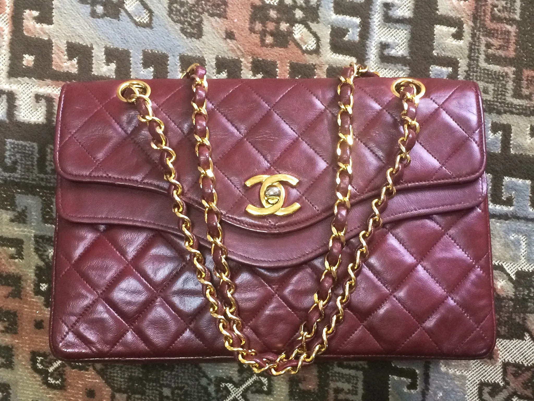 70's, 80's Vintage Chanel wine, bordeaux lambskin rare 2.55 double flap chain shoulder bag. One-of-a-kind bag back in the era.