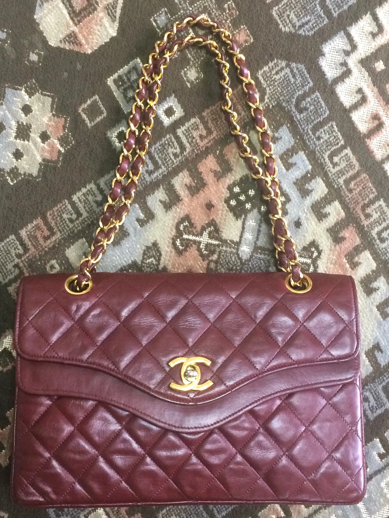 70's, 80's Vintage Chanel wine, bordeaux lambskin rare 2.55 double flap chain shoulder bag. One-of-a-kind bag back in the era.