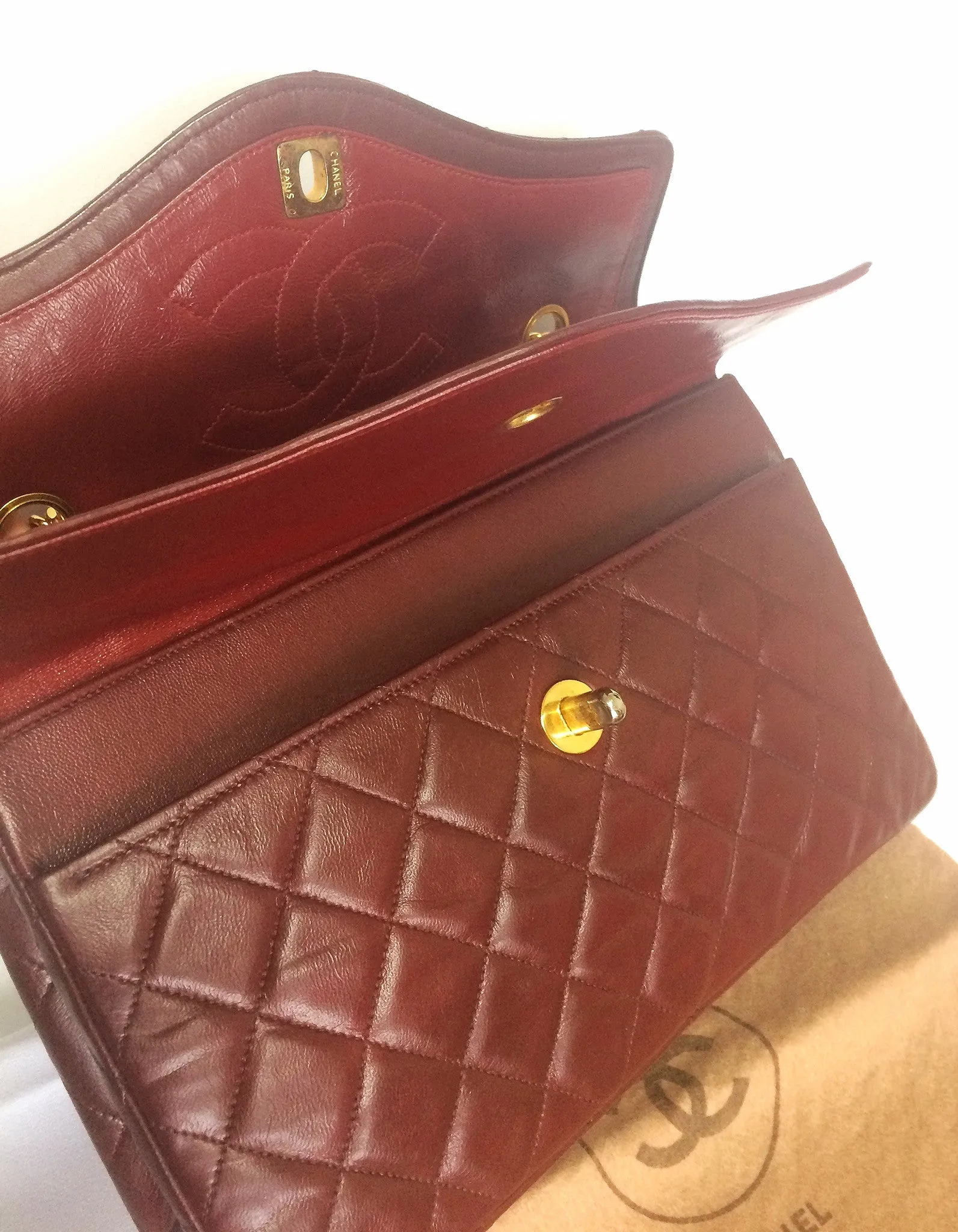 70's, 80's Vintage Chanel wine, bordeaux lambskin rare 2.55 double flap chain shoulder bag. One-of-a-kind bag back in the era.