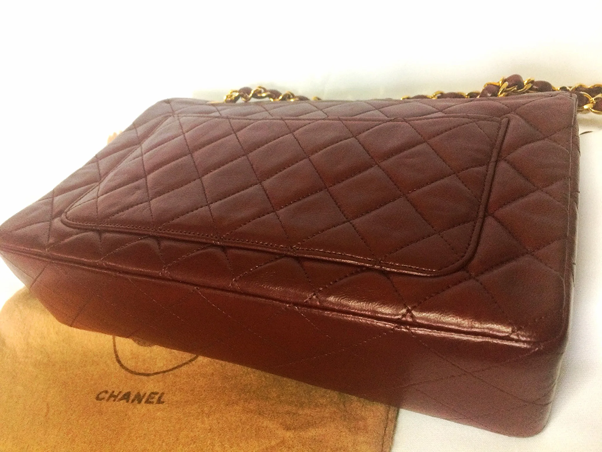 70's, 80's Vintage Chanel wine, bordeaux lambskin rare 2.55 double flap chain shoulder bag. One-of-a-kind bag back in the era.