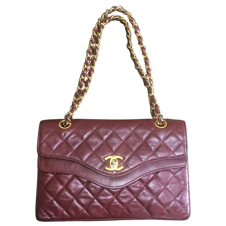 70's, 80's Vintage Chanel wine, bordeaux lambskin rare 2.55 double flap chain shoulder bag. One-of-a-kind bag back in the era.