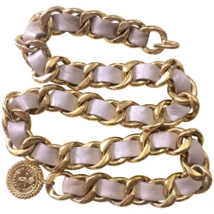 80's Vintage CHANEL beige leather thick chain belt with golden CC and mademoiselle charm. Nice and heavy single layer belt from CHANEL.