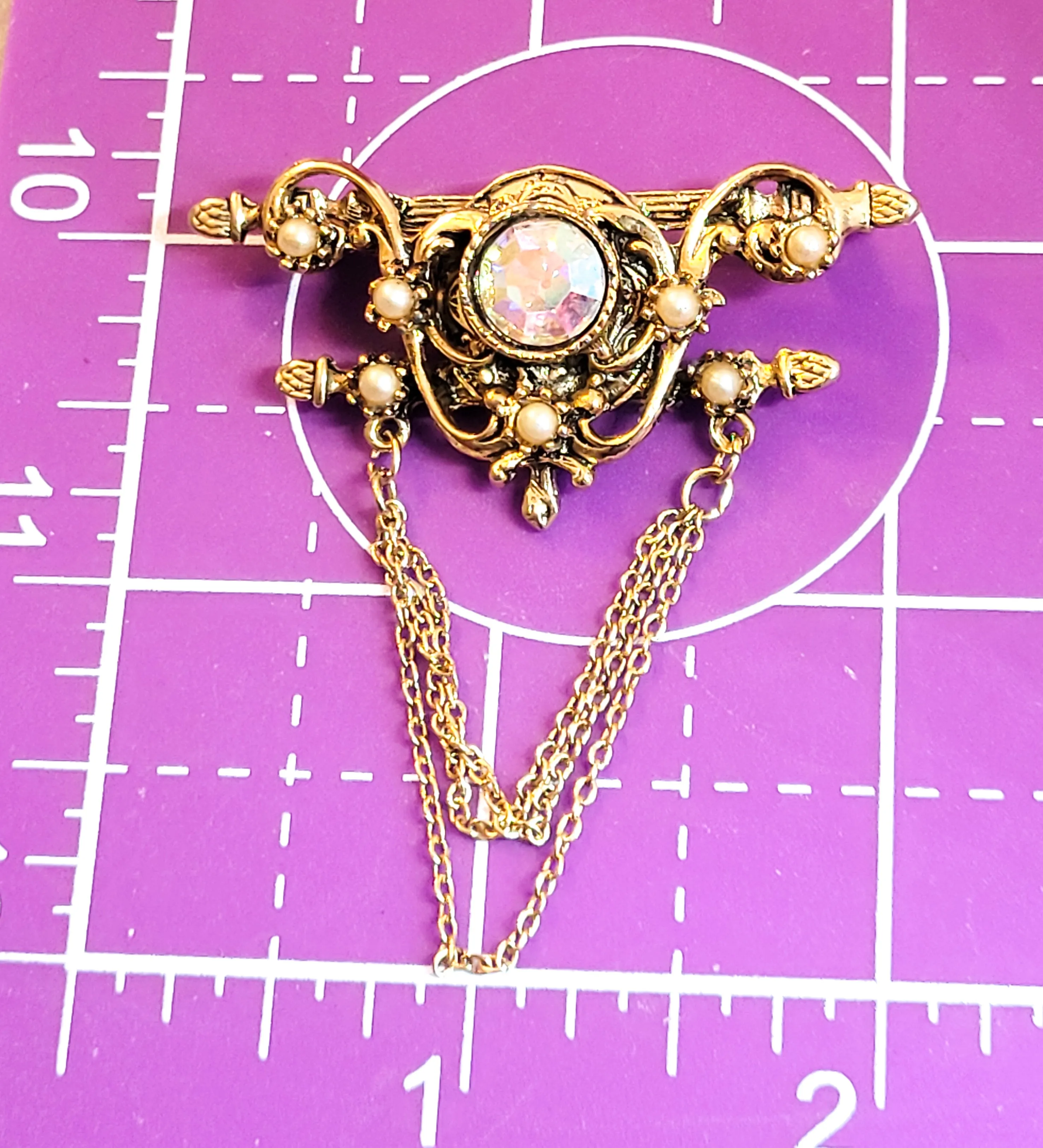 Festoon style pearl and aurora borealis rhinestone vintage brooch