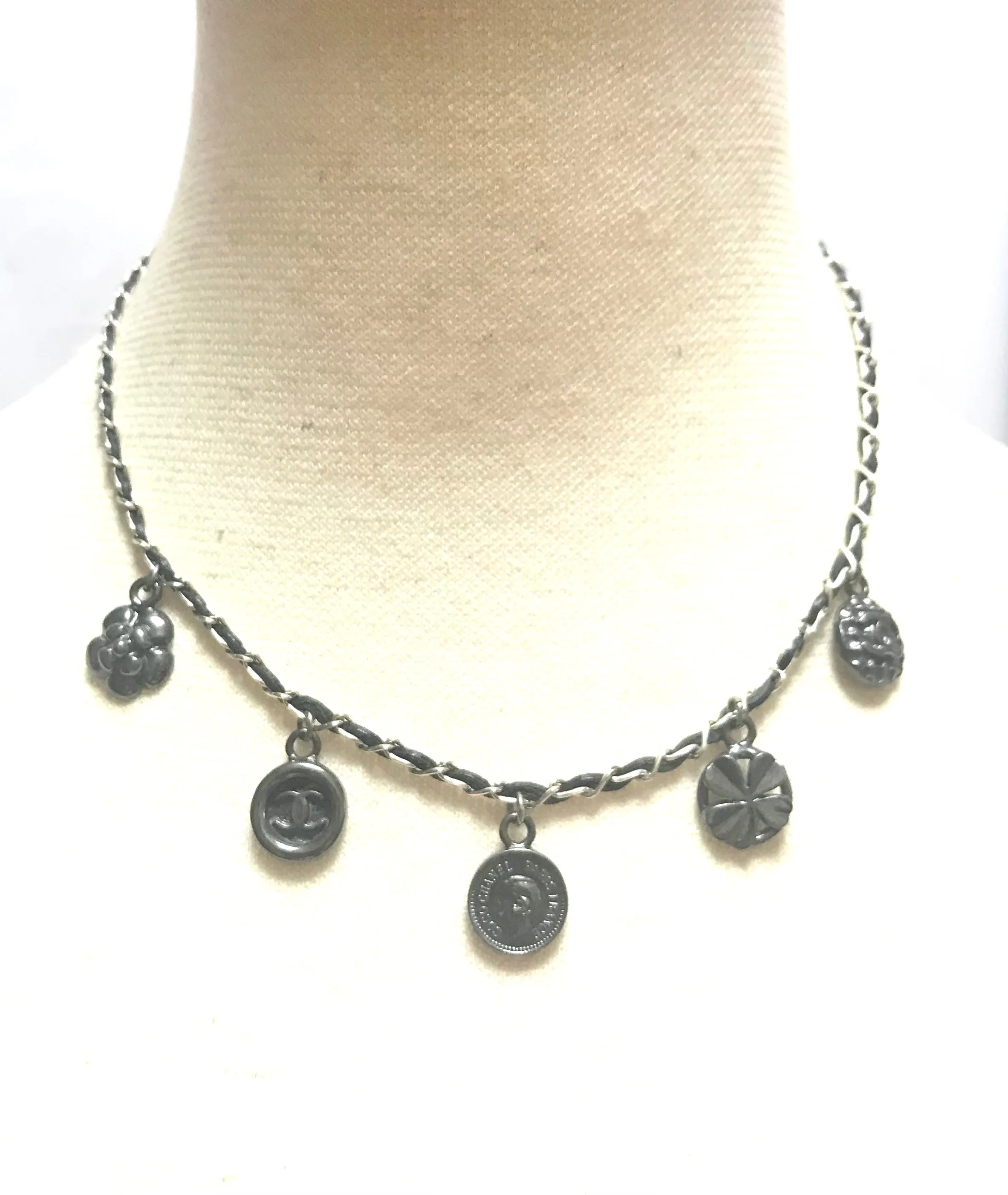 MINT. Vintage CHANEL skinny silver chain necklace with symbolic coin charms and black leather. Can be bracelet too. 060531r1