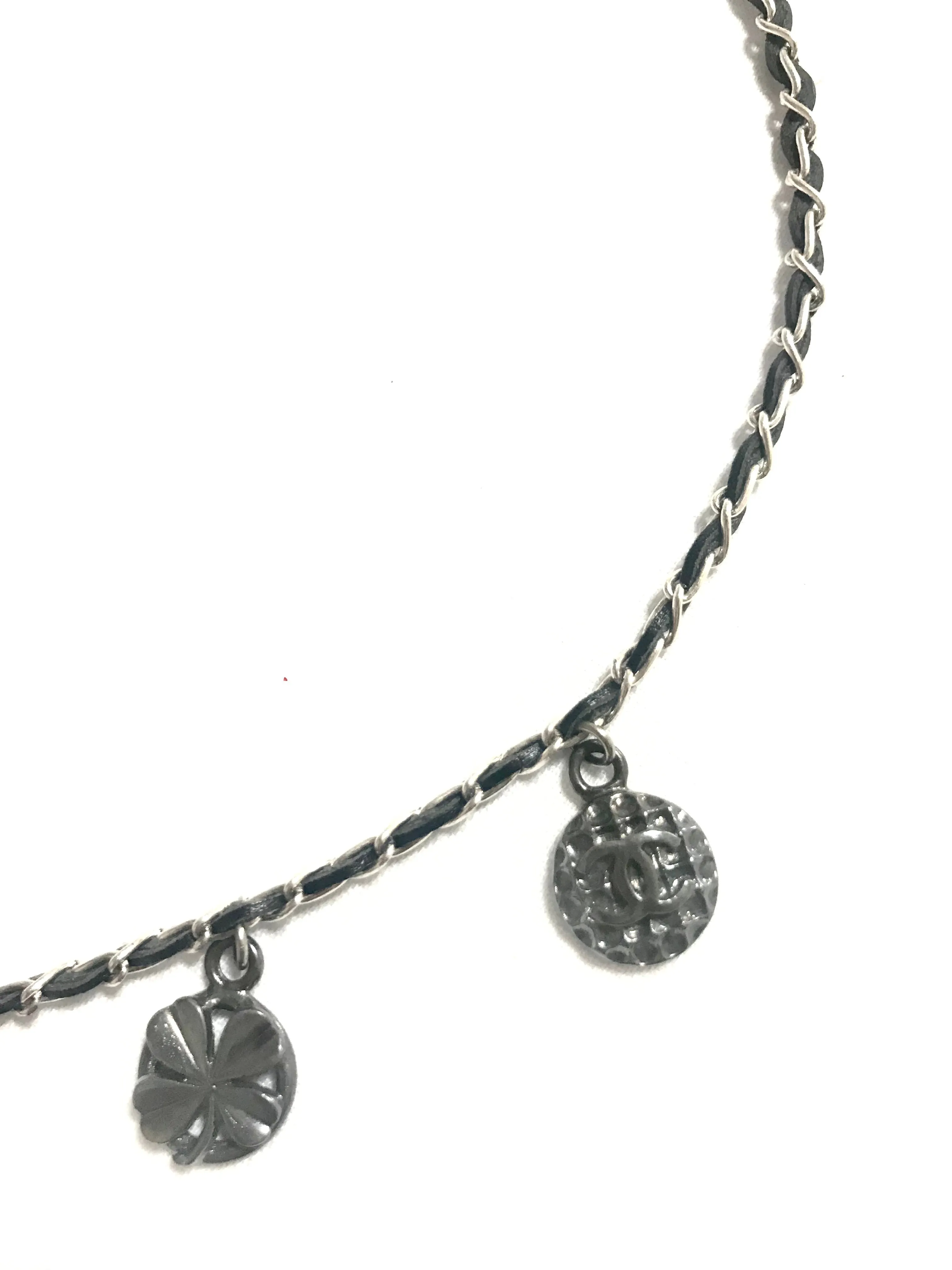 MINT. Vintage CHANEL skinny silver chain necklace with symbolic coin charms and black leather. Can be bracelet too. 060531r1