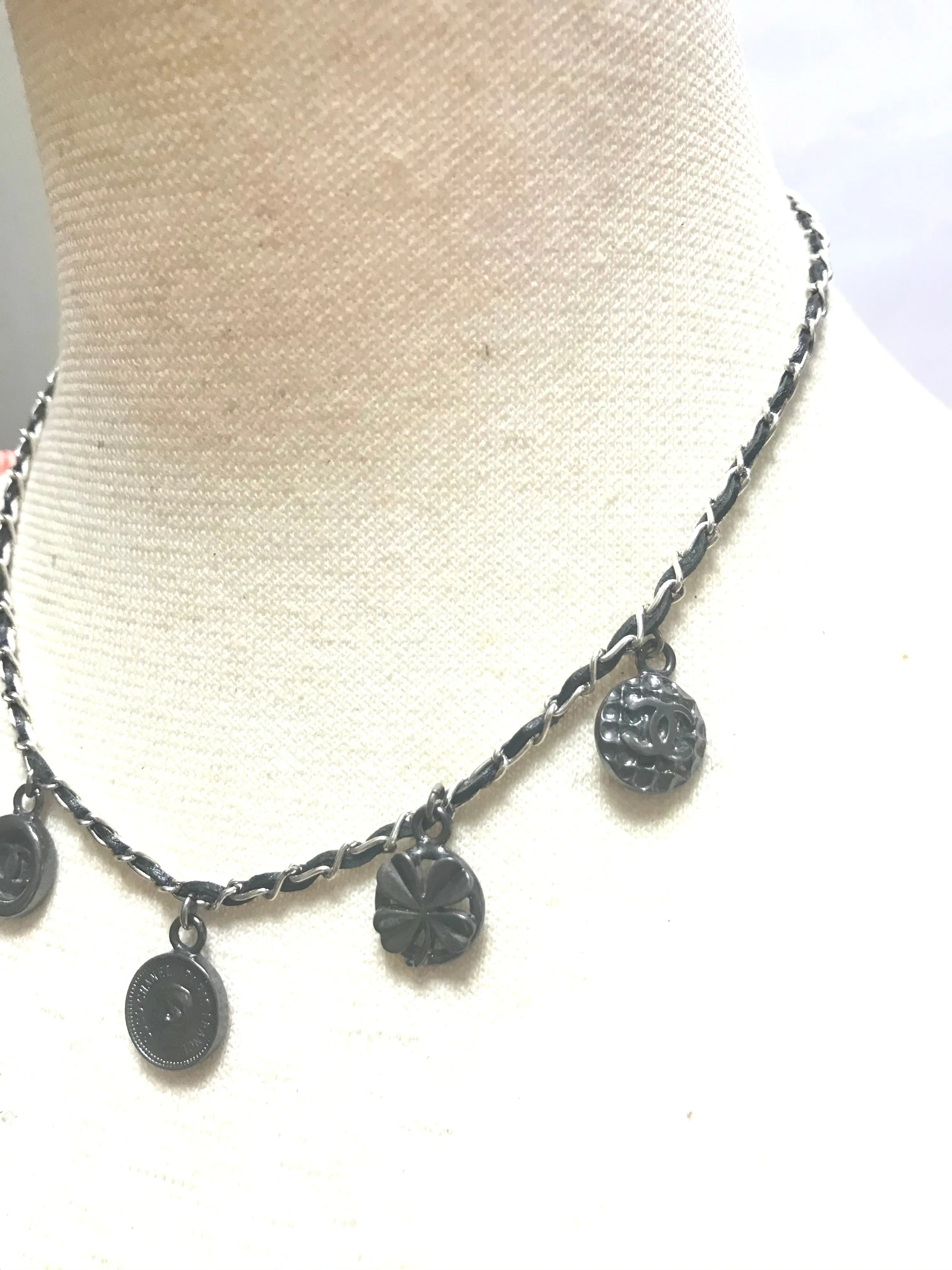 MINT. Vintage CHANEL skinny silver chain necklace with symbolic coin charms and black leather. Can be bracelet too. 060531r1