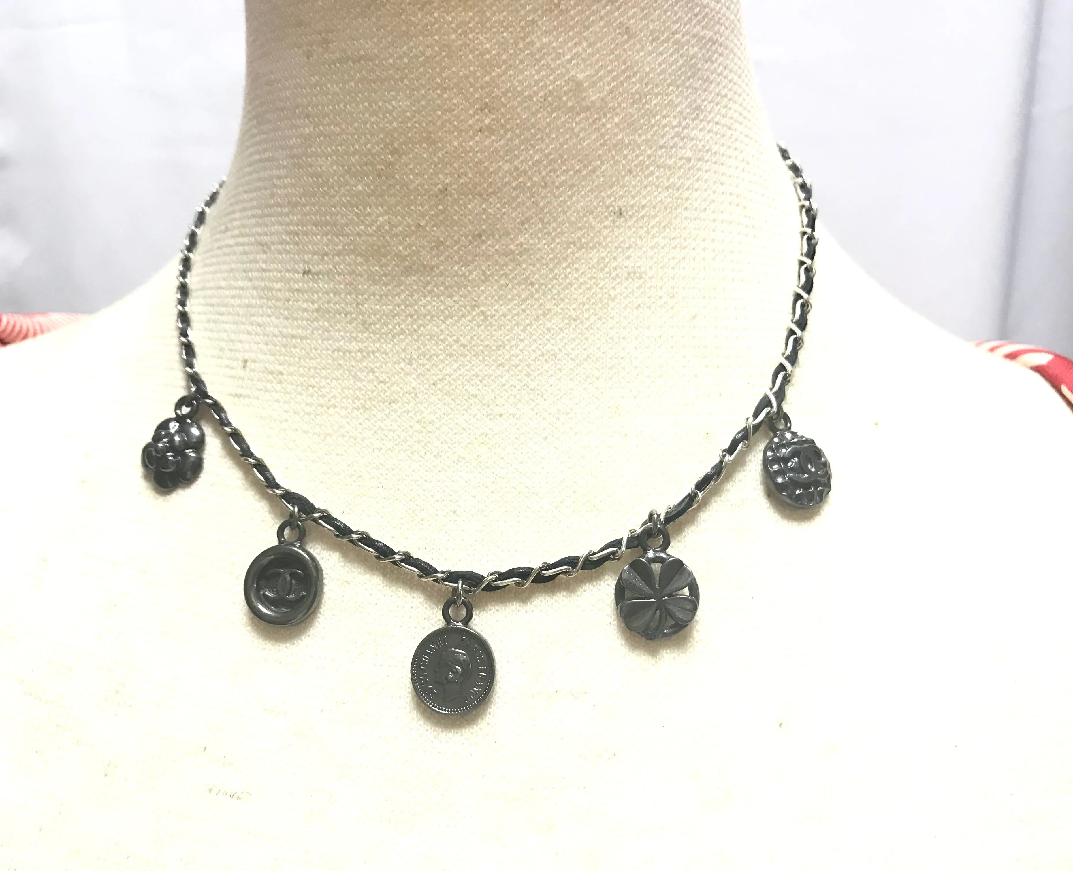 MINT. Vintage CHANEL skinny silver chain necklace with symbolic coin charms and black leather. Can be bracelet too. 060531r1