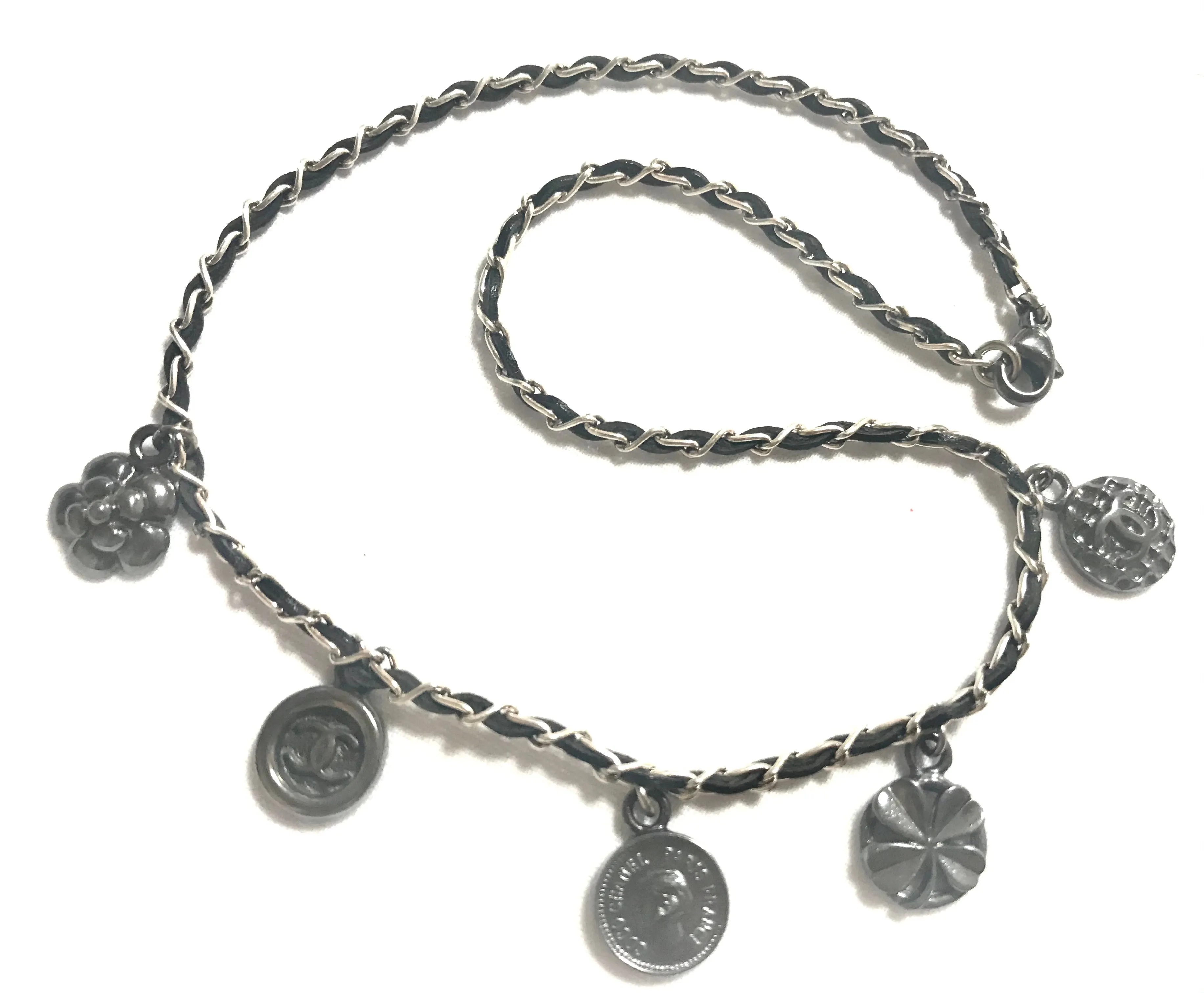MINT. Vintage CHANEL skinny silver chain necklace with symbolic coin charms and black leather. Can be bracelet too. 060531r1