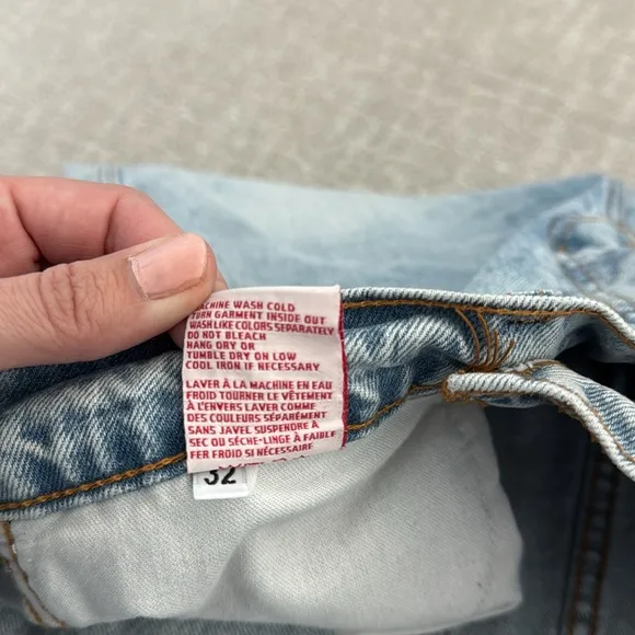 Revice “90’s Baby” Asymmetrical High Waist Jeans in Joey Wash denim light