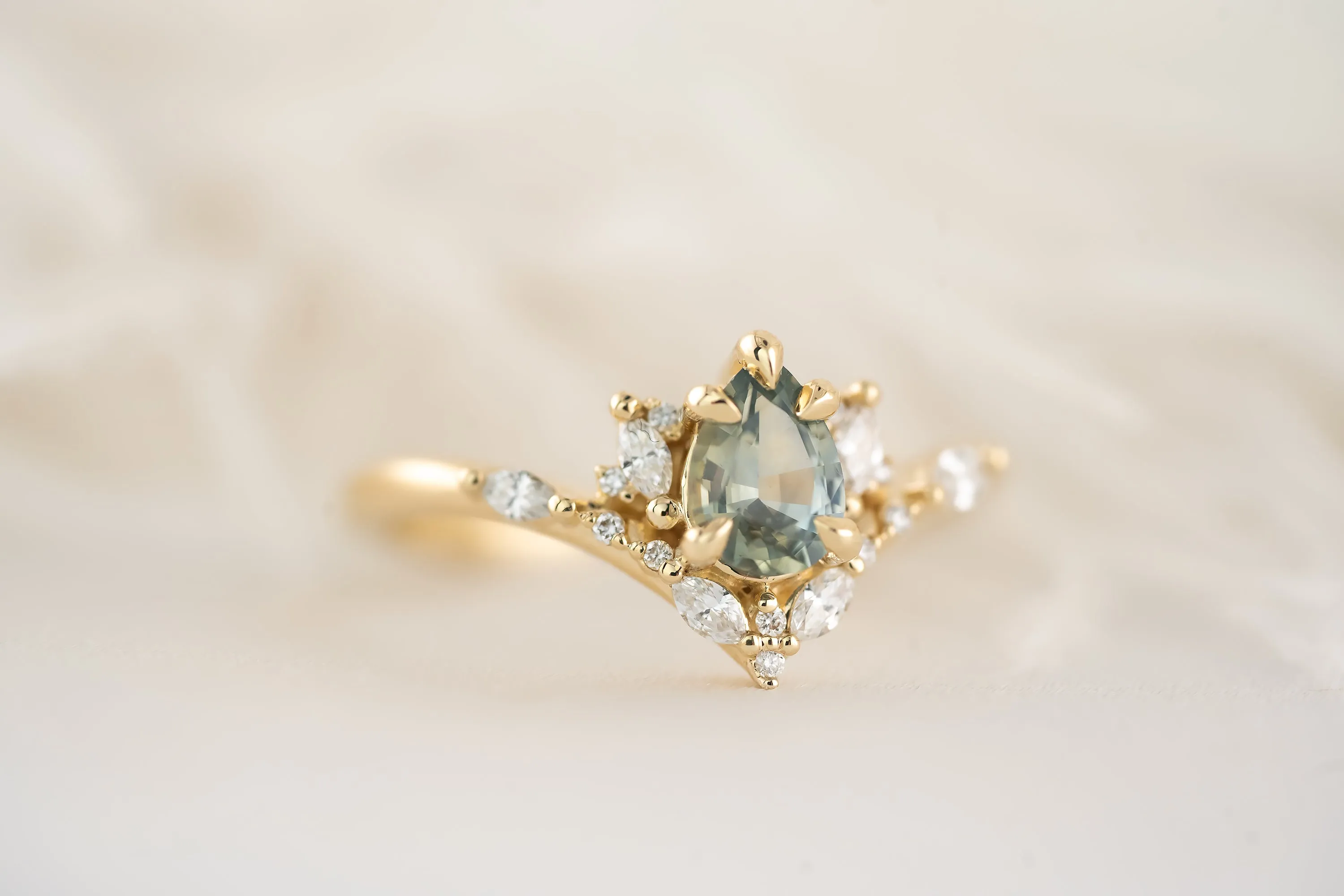 The Aurora Ring - 0.68 CT Pear Blue Montana Sapphire
