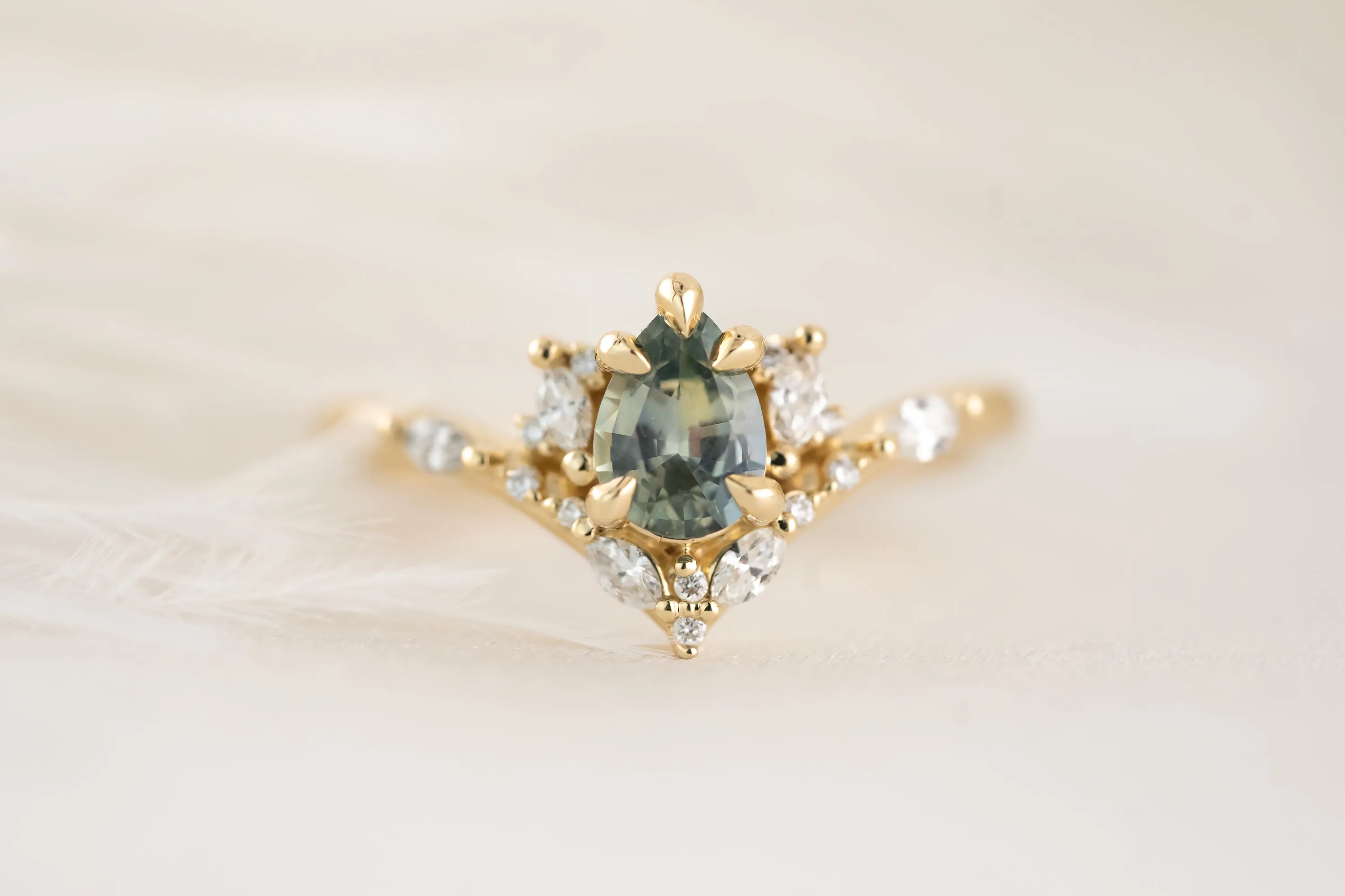 The Aurora Ring - 0.68 CT Pear Blue Montana Sapphire